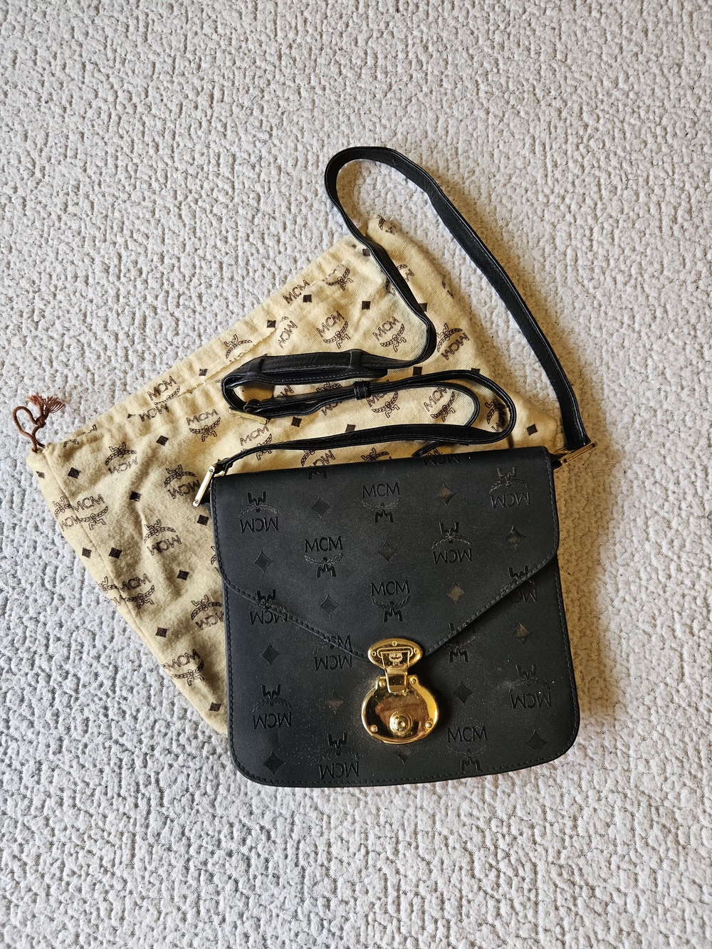 MCM Black Logo-Embossed Crossbody with Gold Lock